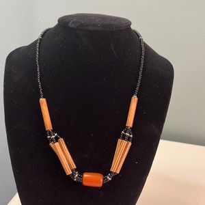 N33. Wooden and glass beaded necklace.